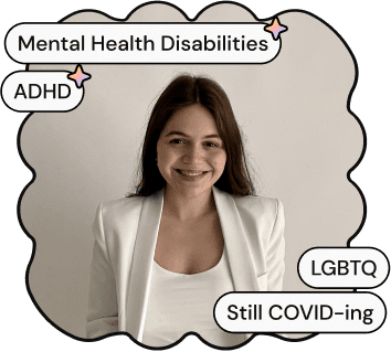 A photo of Eliana, one of ND Connect's co-founders. She is a white woman with long brown hair, smiling at the camera. She is wearing a white shirt and blazer.