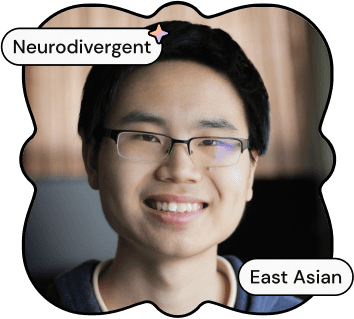 A photo of Peter, one of ND Connect's co-founders. He is an East Asian man with short black hair and glasses, smiling at the camera. SHe is wearing a blue shirt.